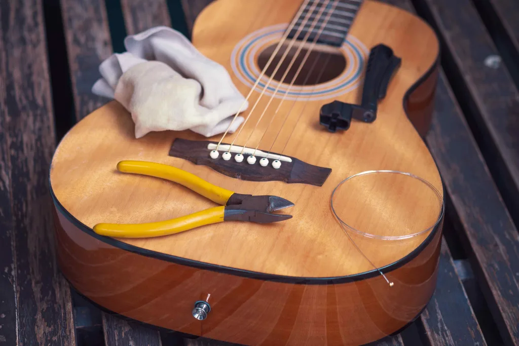 How to cut guitar strings without wire cutter? [Updated