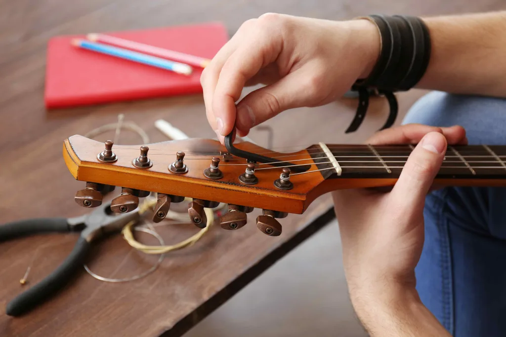 loosen the truss rod