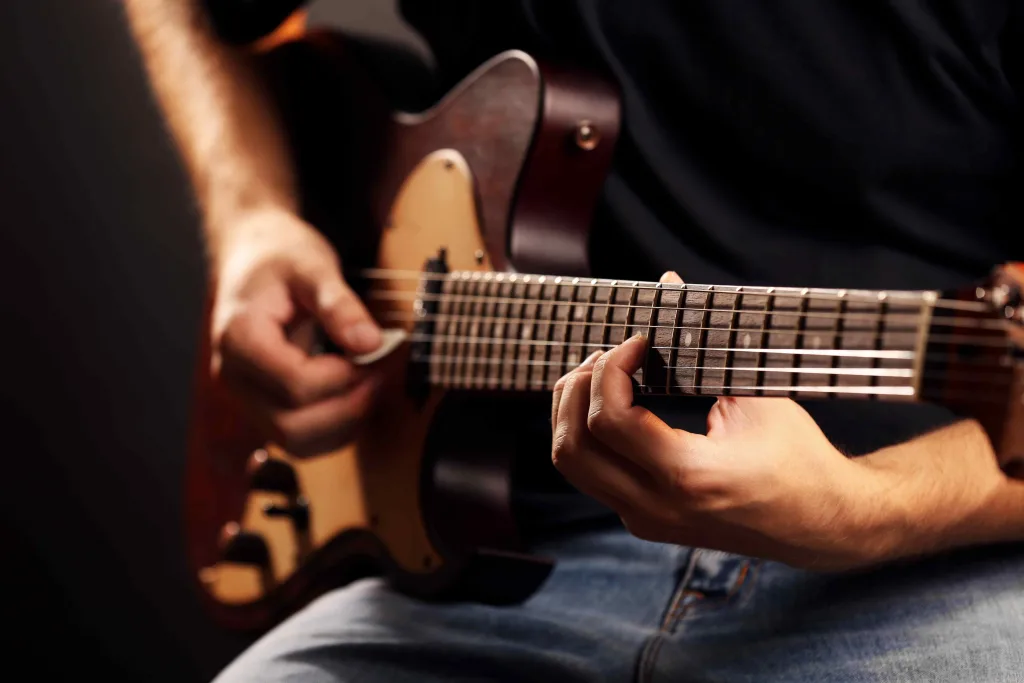 the Difference Between Delay Vs Reverb Guitar Pedals