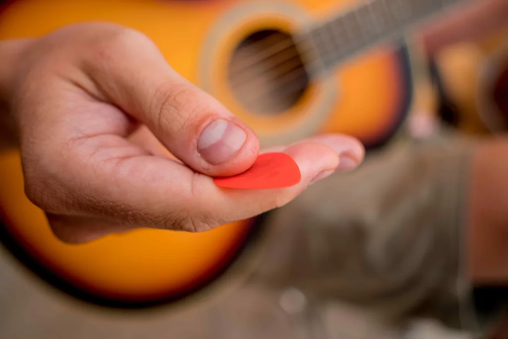 Learn guitar without a pick